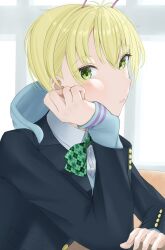 1girl alien antennae black_jacket blonde_hair blue_hoodie blush bow bowtie closed_mouth dandadan elbow_rest from_side green_bow green_bowtie green_eyes hand_on_own_cheek hand_on_own_face hashtag-only_commentary head_rest highres hood hood_down hoodie indoors jacket kaneko_0888 long_sleeves looking_at_viewer short_hair sleeves_past_wrists solo upper_body vamola_(dandadan)