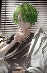 1boy bishounen black_shirt closed_mouth cup daenarys disposable_cup expressionless finger_to_own_chin flower green_eyes green_hair hair_between_eyes hair_over_one_eye highres holding holding_cup indoors jacket lily_(flower) looking_at_viewer male_focus mug original shirt short_hair signature sitting solo t-shirt upper_body white_flower white_jacket window_blinds