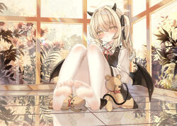 1girl blonde_hair blue_archive blush demon_tail demon_wings feet highres horns ibuki_(blue_archive) long_hair looking_at_viewer pantyhose pout side_ponytail soles stuffed_animal stuffed_toy tail teddy_bear toes white_pantyhose wings yellow_eyes zserty555