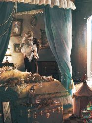 1boy 1girl barefoot bed black_jacket black_pants book brown_hair canopy_bed carrying carrying_person chest_of_drawers circus_tent clown commentary_request curtains desk_lamp doll dress feathers formal_clothes indoors jacket kobone_awaki lamp light_particles original painting_(object) pants pillow princess_carry scissors size_difference suit suitcase tassel white_dress white_hair