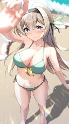 1girl absurdres arm_up bare_arms bare_legs bare_shoulders beach bikini blush breasts cleavage closed_mouth collarbone firefly_(honkai:_star_rail) front-tie_bikini_top front-tie_top green_bikini grey_hair hair_between_eyes hair_intakes hair_ornament highres honkai:_star_rail honkai_(series) large_breasts long_hair mattsi_hbkk navel side-tie_bikini_bottom smile solo standing stomach swimsuit