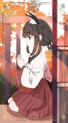 Rule 34 | 1girl, animal ears, azur lane, breasts, brown hair, cahiua1205, fox ears, hakama, hakama skirt, highres, indoors, japanese clothes, kimono, long hair, looking to the side, miko, nagato (azur lane), own hands together, red hakama, ribbon-trimmed sleeves, ribbon trim, seiza, shirt, sitting, skirt, small breasts, torii, white kimono, white shirt, wide sleeves, yellow eyes