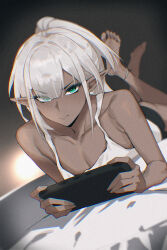 1boy ass bare_shoulders barefoot blush dark-skinned_male dark_skin earrings ei_(eiei_e1) green_eyes handheld_game_console highres indie_virtual_youtuber jewelry long_hair looking_at_viewer lying male_focus minko_xiv on_stomach pointy_ears ponytail shorts solo tank_top trap virtual_youtuber white_hair