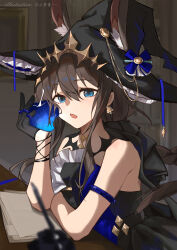 1girl absurdres amiya_(arknights) amiya_(medic)_(arknights) amiya_(medic)_(solo_around_the_world)_(arknights) animal_ear_fluff animal_ears apple arknights bare_shoulders bell bell_earrings black_dress black_hat blue_eyes blurry blurry_foreground braid brown_hair commentary_request depth_of_field dress earrings ears_through_headwear food frills fruit hair_between_eyes hand_up hat highres holding holding_food holding_fruit inkwell jewelry long_hair looking_at_viewer open_mouth rabbit_ears solo very_long_hair witch_hat yume-dream