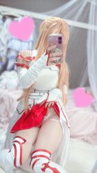 1girl asuna_(sao) bed belt blurry blurry_background censored clothes_lift cosplay covered_face dress fingerless_gloves gloves heart heart_censor highres holding holding_phone nagomitei_chu3 panties phone photo_(medium) real_life red_skirt sitting skirt skirt_lift sword_art_online thighhighs underwear white_dress white_gloves white_panties