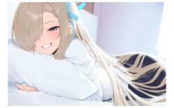 1girl absurdres asuna_(blue_archive) asuna_(school_uniform)_(blue_archive) blue_archive blue_eyes blurry blush breasts depth_of_field grin hair_over_ass hair_over_one_eye hair_ribbon half-closed_eyes highres indoors large_breasts long_hair looking_at_viewer lying on_stomach pillow pleated_skirt ribbon skirt smile solo syahrul4567 teeth