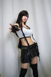 1girl bare_shoulders black_gloves black_hair black_skirt black_thighhighs breasts female_focus final_fantasy final_fantasy_vii final_fantasy_vii_remake fingerless_gloves gloves highres ja10888 korean_(nationality) large_breasts long_hair midriff navel real_life red_eyes skirt solo square_enix suspenders tank_top thighhighs tifa_lockhart tifa_lockhart_(cosplay) white_tank_top