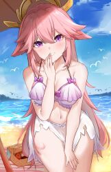 1girl animal_ears basket beach bikini blush breasts cleavage collarbone fox_ears fox_girl genshin_impact hair_between_eyes hair_ornament hand_on_own_thigh hand_to_own_mouth highres hwpk4537 large_breasts long_hair looking_at_viewer navel ocean parted_lips pink_hair purple_bikini purple_eyes smile solo stomach swimsuit thighs yae_miko