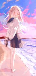 1girl bare_legs beach black_sailor_collar black_skirt blonde_hair blush colored_eyelashes commentary_request dnamaguro earrings gakuen_idolmaster highres holding holding_shoes idolmaster jewelry long_hair long_sleeves looking_at_viewer looking_to_the_side orange_eyes outdoors pleated_skirt sailor_collar sand school_uniform serafuku shinosawa_hiro shirt shoes sidelighting skirt smile solo stud_earrings twilight unworn_shoes very_long_hair white_shirt