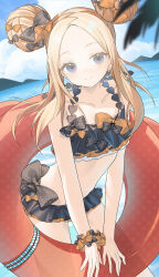 1girl abigail_williams_(emerald_float)_(fate) abigail_williams_(fate) absurdres bare_shoulders beach bikini black_bikini black_bow black_skirt blonde_hair blue_eyes blue_sky blush bow breasts collarbone double_bun fate/grand_order fate_(series) forehead frilled_bikini frills hair_bow hair_bun highres innertube long_hair looking_at_viewer microskirt miyu10366 navel ocean orange_bow parted_bangs skirt sky small_breasts smile solo swim_ring swimsuit thighs