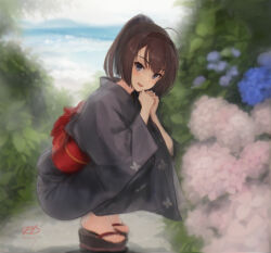 1girl ahoge akizuki_(kancolle) alternate_costume bikini black_hair blue_flower blush brown_hair bush commentary_request day flower grey_hair hair_between_eyes haruto_(harut_n) kantai_collection long_sleeves medium_hair no_socks obi ocean open_mouth outdoors ponytail print_bikini sandals sash sidelocks smile solo squatting swept_bangs swimsuit twitter_username watermark white_flower wide_sleeves