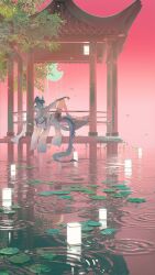 1girl absurdres architecture arknights arm_on_knee artist_name black_shorts blue_hair boots braid cattail coat cup east_asian_architecture highres holding holding_cup horns lake lantern leaf lily_pad ling_(arknights) long_hair looking_at_viewer lying moon paper_lantern pavilion plant pointy_ears red_theme reflection reflective_water shorts single_braid smile spill spilling tail toto_(caaaaarrot) tree water white_boots white_coat wide_sleeves