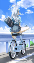 1girl absurdres ass bag bicycle black_skirt blue_archive blue_shirt blue_sky cloud cloudy_sky commentary_request cup day floral_print_shirt from_behind grey_hair grey_halo halo hawaiian_shirt highres holding holding_cup konoka_(blue_archive) kuroi_suna long_hair miniskirt outdoors pleated_skirt road school_bag shirt short_sleeves shoulder_bag sitting skirt sky thighs