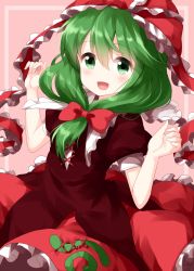 1girl bow cowboy_shot dress frilled_ribbon frills front_ponytail green_eyes green_hair hair_between_eyes hair_bow highres kagiyama_hina long_hair looking_at_viewer open_mouth pink_background red_bow red_dress red_ribbon ribbon ruu_(tksymkw) short_sleeves simple_background smile solo spiral standing touhou