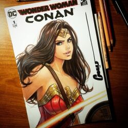 1girl armor art_tools_in_frame artist_name black_hair breasts dc_comics lasso_of_truth lipstick lowres makeup medium_breasts omar_dogan shield signature wonder_woman