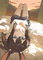 1girl arknights blue_eyes blush breasts brown_hair character_request cleavage collarbone double-parted_bangs hashtag-only_commentary highres lying nagisa_(cxcx5235) on_back on_bed plaid_clothes plaid_skirt selfie shirt sidelocks skirt solo sunrise white_shirt