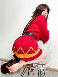 Rule 34 | 1girl, absurdres, ass, asymmetrical legwear, barefoot, belt, black cape, black hat, black socks, brown hair, cape, carpet, chair, cosplay, cosplay photo, dress, feet, from behind, hat, highres, indoors, kneehighs, kneeling, kono subarashii sekai ni shukufuku wo!, lips, long hair, looking at viewer, looking back, megumin, megumin (cosplay), mismatched legwear, photo (medium), red dress, sidelocks, single kneehigh, single sock, socks, soles, solo, stelarhoshi, toes, transparent, unworn hat, unworn headwear, wall, witch hat, yellow trim