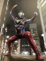 1boy absurdres alien arm_up armor black_sky blue_skin breastplate building car city city_lights cityscape clenched_hand colored_skin commentary compound_eyes crosswalk dorsal_fin fighting_stance from_below full_body giant glowing glowing_eyes gold_trim highres kei_truck lamppost legs_apart location_request looking_ahead male_focus motor_vehicle multicolored_skin muscular muscular_male night outdoors outstretched_arm pectorals people photo_background pickup_truck real_world_location red_skin road_sign shoulder_armor sign silver_skin sky skyscraper solo_focus standing tokusatsu traffic_light truck ultra_series ultraman_gaia ultraman_gaia_(series) ultraman_gaia_(supreme_version) wrinkled_skin yellow_eyes yoshifuto