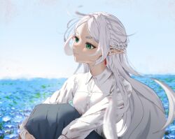 1girl blue_skirt blue_sky collared_shirt day earrings elf field flower flower_field frieren green_eyes highres hugging_own_legs jewelry knees_up long_hair long_sleeves outdoors pointy_ears shirt skirt sky solo sousou_no_frieren tanac_mangi white_hair