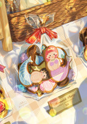 absurdres bag cookie english_text food food_focus highres mermaid merman monster_boy monster_girl original plastic_bag red_ribbon ribbon still_life trinose