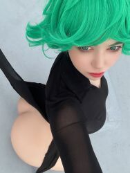 1girl alina_becker ass black_dress breasts cosplay dress female_focus from_above green_eyes green_hair highres lipstick looking_at_viewer looking_up makeup medium_breasts no_panties one-punch_man photo_(medium) solo tagme tatsumaki tatsumaki_(cosplay)