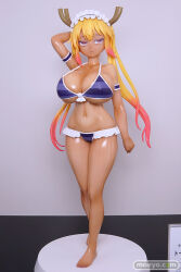 1girl angry antlers arm_up armlet bikini blonde_hair breasts dark-skinned_female dark_skin figure frills gradient_hair horns huge_breasts jewelry kobayashi-san_chi_no_maidragon long_hair maid_headdress multicolored_hair orange_eyes orange_hair photo_(medium) purple_bikini striped_bikini striped_clothes swimsuit tan tohru_(maidragon) wide_hips