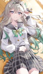 1girl black_hairband black_ribbon blush bow bowtie buttons collared_shirt double-breasted firefly_(honkai:_star_rail) firefly_(spring_missive)_(honkai:_star_rail) gradient_eyes gradient_hair green_bow green_bowtie green_pupils grey_hair grey_sailor_collar grey_skirt hair_between_eyes hair_intakes hair_ornament hair_ribbon hairband highres honkai:_star_rail honkai_(series) long_hair long_sleeves lying multicolored_eyes multicolored_hair on_back plaid_bow plaid_bowtie plaid_clothes pleated_skirt ribbon sailor_collar shirt skirt smile solo syarou twitter_username white_shirt white_sleeves