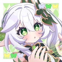 1girl :o bare_shoulders blush commentary gem genshin_impact gold_trim gradient_hair green_eyes green_gemstone green_hair hair_between_eyes hair_ornament hands_up highres leaf_hair_ornament long_hair multicolored_hair nahida_(genshin_impact) pointy_ears side_ponytail signature sleeveless solo star-shaped_pupils star_(symbol) symbol-shaped_pupils tonbofree upper_body white_hair