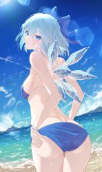 1girl absurdres adjusting_clothes adjusting_swimsuit ass beach bikini blue_bikini blue_bow blue_eyes blue_hair blue_sky bow breasts cirno commentary_request cowboy_shot day hair_bow highres ice ice_wings kisaragi_yuu_(user_kfua8252) looking_at_viewer looking_back ocean sky small_breasts solo swimsuit touhou wings