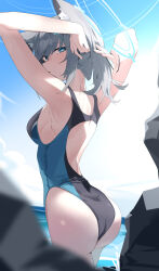 1girl absurdres animal_ear_fluff animal_ears black_one-piece_swimsuit blue_archive blue_eyes blush cross_hair_ornament from_behind grey_hair hair_ornament highres looking_at_viewer ocean official_alternate_costume one-piece_swimsuit open_mouth shiroko_(blue_archive) shiroko_(swimsuit)_(blue_archive) solo sweat swimsuit tying_hair wako_(1194433260) wolf_ears wolf_girl