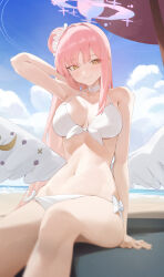 1girl alternate_costume arm_behind_head arm_up beach bikini blue_archive blue_sky blush breasts closed_mouth cloud cloudy_sky commentary_request feathered_wings front-tie_bikini_top front-tie_top hair_bun halo highres horizon large_breasts long_hair looking_at_viewer low_wings mika_(blue_archive) navel ocean outdoors pink_hair pink_halo single_hair_bun single_side_bun sky smile solo swimsuit thighs white_bikini white_wings wing_ornament wings yellow_eyes yidh_79