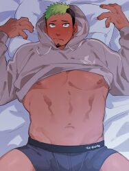 1boy abs asymmetrical_hair bara black_hair blue_male_underwear blush closed_mouth facial_hair goatee_stubble green_eyes green_hair grey_hoodie highres hood hoodie ikusaba_daisuke looking_at_viewer lying male_focus male_underwear multicolored_hair muscular muscular_male navel nervous_sweating nipples official_alternate_costume on_back on_bed pillow shy solo strongman_waist stubble sweat tokyo_houkago_summoners two-tone_hair underpec underwear upper_body wanijima