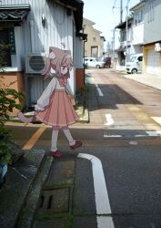 1girl ahoge animal_ear_fluff animal_ears blush bow bowtie brown_hair brown_shoes building car cat_ears cat_girl cat_tail closed_mouth collared_shirt commentary_request day detached_ahoge full_body highres long_sleeves medium_hair mixed_media motor_vehicle nakkar original outdoors photo_background plaid_bow pleated_skirt red_bow red_bowtie red_eyes red_skirt road school_uniform shirt shoes skirt socks solo standing tail twintails twitter_username walking white_shirt white_socks