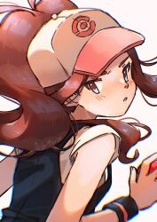1girl alien_ashi artist_name black_vest blue_eyes brown_hair commentary english_commentary from_behind hat highres hilda_(pokemon) holding holding_poke_ball long_hair looking_at_viewer looking_back nintendo poke_ball poke_ball_(basic) pokemon pokemon_bw shirt solo upper_body vest white_background white_hat white_shirt