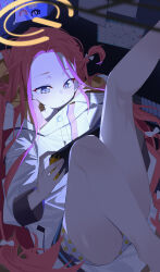 1girl absurdres bare_legs blue_archive blue_eyes blue_panties closed_mouth forehead handheld_game_console highres holding holding_handheld_game_console jacket long_hair no_pants panties polka_dot red_hair solo underwear wako_(1194433260) white_jacket yuzu_(blue_archive)