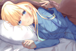 1girl aizawa_ema alternate_costume amaner blanket blonde_hair blue_eyes blue_pajamas blue_pupils blue_shirt closed_mouth head_on_pillow highres light_blush long_hair looking_at_viewer lying on_bed on_side pajamas pillow shirt smile solo under_covers upper_body virtual_youtuber vspo!