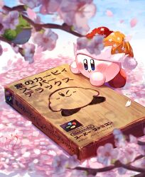 beam_kirby bird blue_eyes blue_sky blurry blurry_foreground blush box cherry_blossoms closed_eyes closed_mouth commentary falling_petals from_above hat highres in_tree jester_cap kahonnta_(fnns3543) kirby kirby_(series) kirby_super_star looking_at_object nintendo outdoors petals pink_petals pitch_(kirby) pom_pom_(clothes) red_hat signature sky smile solo_focus tree two-tone_hat video_game_cover_(object) yellow_hat