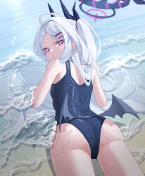 1girl ahoge ass beach black_horns black_wings blue_archive commentary_request demon_girl demon_horns demon_wings from_behind hair_intakes highres hina_(blue_archive) hina_(swimsuit)_(blue_archive) horns korean_commentary long_hair looking_at_viewer looking_back low_wings lying mahou_gnome multiple_horns ocean official_alternate_costume old_school_swimsuit on_stomach purple_eyes school_swimsuit solo swimsuit thighs water wet wet_clothes wet_swimsuit white_hair wings