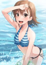 1girl :d arm_up asymmetrical_bangs ball beachball bikini black_bikini blue_bikini breasts brown_eyes brown_hair collarbone highres holding holding_ball holding_beachball k3rd leaning_forward looking_at_viewer medium_hair misaka_mikoto mismatched_bikini ocean open_mouth side-tie_bikini_bottom small_breasts smile solo swimsuit toaru_kagaku_no_railgun toaru_majutsu_no_index wading