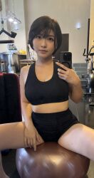 1girl asian black_hair black_shorts breasts female_pervert large_breasts pervert presenting public_indecency real_life selfie sexually_suggestive short_hair shorts solo
