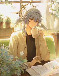 1boy alternate_costume black_shirt book brown_cardigan cardigan closed_mouth coffee_mug commentary cup elbow_rest facing_viewer feathered_wings flower grey_hair hair_between_eyes halo halo_behind_head head_wings heeri highres holding holding_cup honkai:_star_rail honkai_(series) indoors long_sleeves male_focus medium_hair mug open_book open_cardigan open_clothes plant potted_plant reading shirt sitting solo spiked_halo sunday_(honkai:_star_rail) sunlight table vase white_wings window wings yellow_eyes