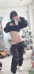 1girl absurdres black_hair bra cellphone highres indoors looking_at_phone mirror mirror_selfie navel phone photo_(medium) real_life room selfie short_hair smartphone standing underwear undressing ushijima_iiniku