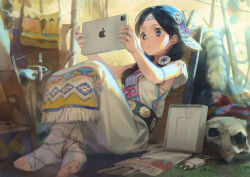 1girl :o absurdres bandaged_leg bandages barefoot black_eyes black_hair box braid breasts ddal feather_hair_ornament feet full_body hair_ornament highres ipad nails native_american original skull small_breasts tablet_pc toeless_footwear toeless_legwear