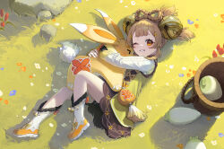 1girl backpack_basket basket bell bow-shaped_hair brown_hair clover_print coin_hair_ornament genshin_impact hair_bell hair_ornament highres hug hugging_object looking_at_viewer lying nyamunyamu on_side one_eye_closed orange_eyes radish smile solo yaoyao_(genshin_impact) yuegui_(genshin_impact)