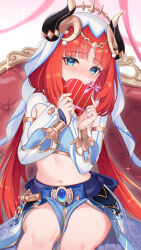 1girl aqua_eyes blue_gemstone blue_nails box breasts circlet commentary couch covering_own_mouth crop_top english_commentary ewaaawa fake_horns gem genshin_impact harem_outfit heart-shaped_box highres holding holding_box horns long_hair long_sleeves looking_at_viewer medium_breasts midriff nail_polish navel nilou_(genshin_impact) on_couch paid_reward_available puffy_long_sleeves puffy_sleeves red_hair sitting solo twintails valentine veil very_long_hair white_veil