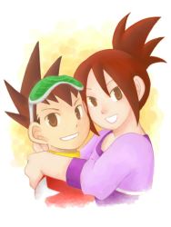 00s 1boy 1girl age_difference blouse brown_eyes brown_hair capcom family geo_stelar_(mega_man) goggles goggles_on_head happy hope_stelar_(mega_man) hug lips lipstick makeup mega_man_(series) mega_man_star_force_(series) mother_and_son open_mouth ponytail shirt smile spiked_hair