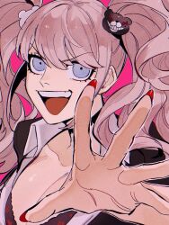 1girl :d bear_hair_ornament black_bra black_shirt blue_eyes bra breasts cleavage collarbone danganronpa:_trigger_happy_havoc danganronpa_(series) enoshima_junko hair_ornament hand_up highres large_breasts long_hair looking_at_viewer nail_polish open_mouth pink_background red_nails shirt simple_background smile solo swept_bangs tongue twintails underwear upper_body wanijima