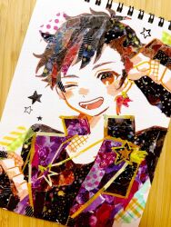1boy ;) arm_up black_gloves black_jacket black_shirt brown_hair clenched_hands commentary ensemble_stars! fingerless_gloves gloves highres jacket male_focus masking_tape_(medium) mixed_media nagumo_tetora one_eye_closed pamutaro photo_(medium) red_eyes shirt short_hair smile solo star_(symbol) symbol-only_commentary t-shirt traditional_media unconventional_media upper_body very_short_hair