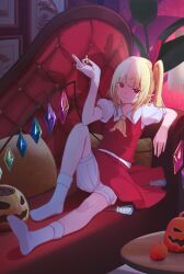 1girl absurdres ascot blonde_hair bloomers candy commentary_request couch crystal_wings elbow_on_knee fern flandre_scarlet food halloween halloween_bucket hand_up highres jack-o&#039;-lantern lollipop medium_hair no_shoes nyaabun on_couch painting_(action) pillow pointy_ears puffy_short_sleeves puffy_sleeves pumpkin reclining red_eyes red_ribbon red_skirt red_vest ribbon short_sleeves side_ponytail skirt smile socks solo touhou underwear vest wallpaper_(object) white_skirt white_socks yellow_ascot