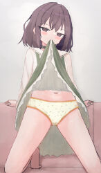1girl arm_support barefoot blush bow_print brown_eyes brown_hair choker clothes_lift clothes_writing couch crotch_seam green_panties green_skirt heart heart_print kneeling loli long_sleeves looking_at_viewer mouth_hold navel on_couch original panties polka_dot polka_dot_panties print_panties school_uniform shirt shooko short_hair skirt skirt_lift suspender_skirt suspenders underwear white_shirt